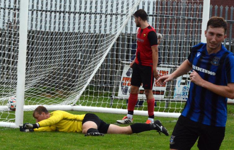 Kieran King - turns away as he scores for Hakin United